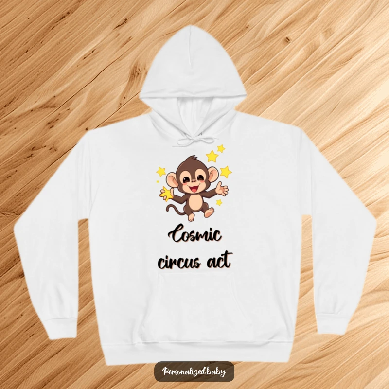 Funny hoodie with a mischievous monkey juggling bright, glowing stars, offering warm, humorous, and celestial comfort.