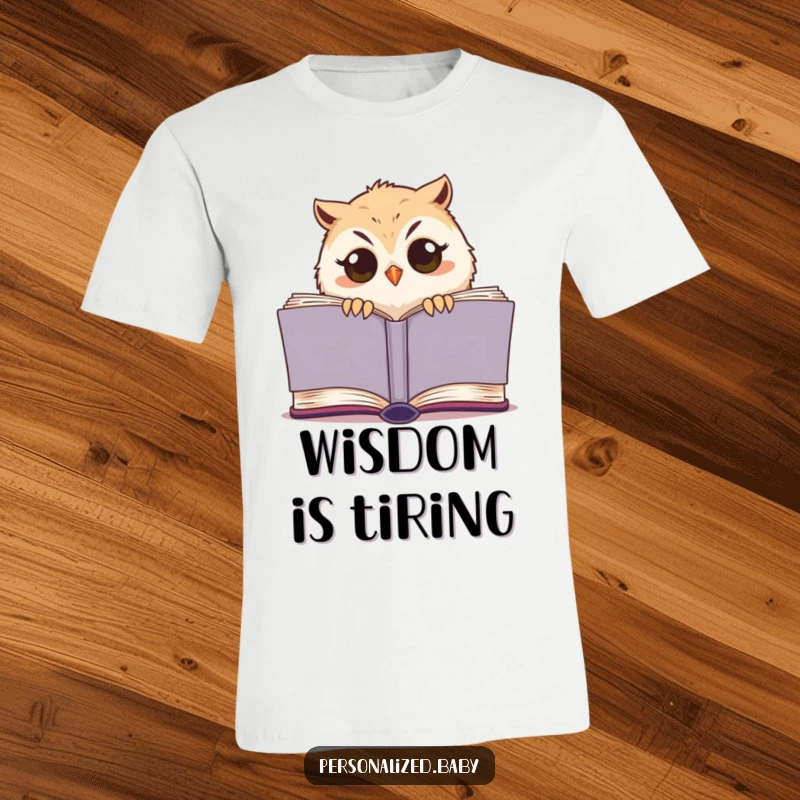 Funny owl chick t-shirt, sleepy bird peeking from a large book, cute and humorous design for book lovers.